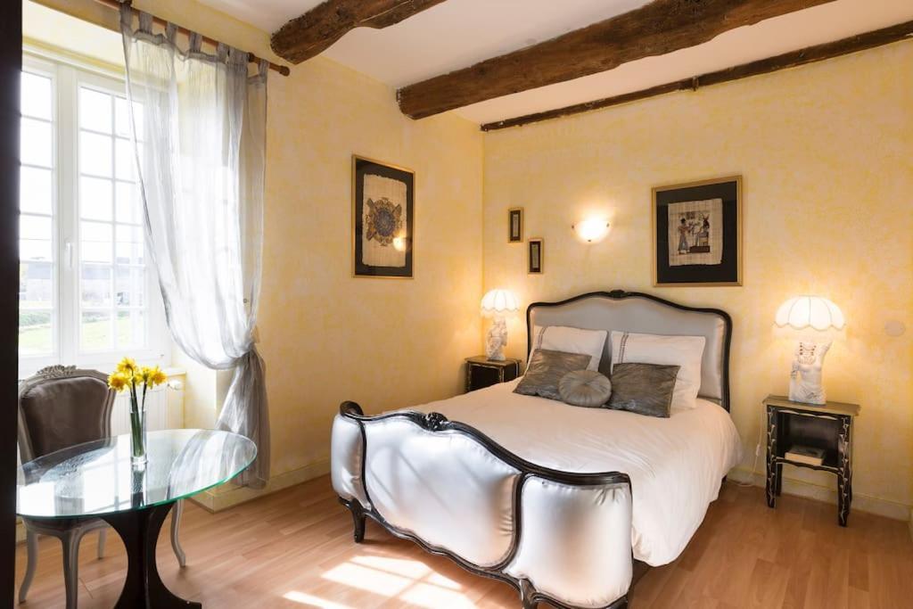 Chambres d'hôtes - Les Palmiers Corseul Extérieur photo